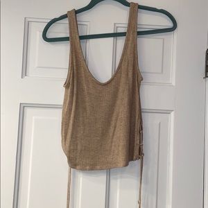 Tan cropped tank top with ties on the side
